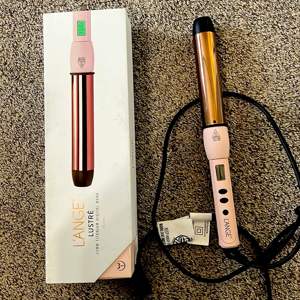 Hair curling Iron, used and in a very good condition.